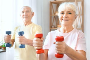 senior man and woman exercising together